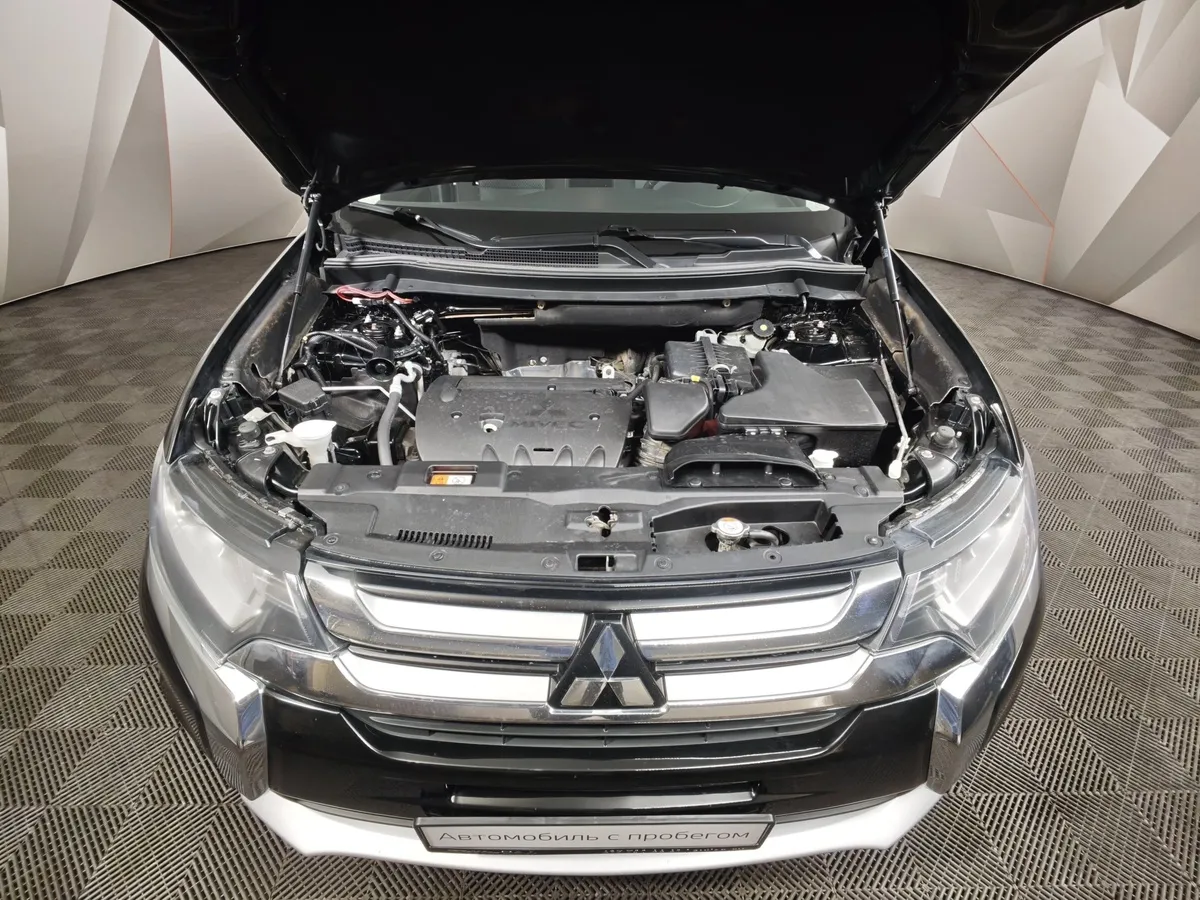 Mitsubishi Outlander 2.0 CVT 4WD (146 л.с.) Черный в АВИЛОН. Слайд №11