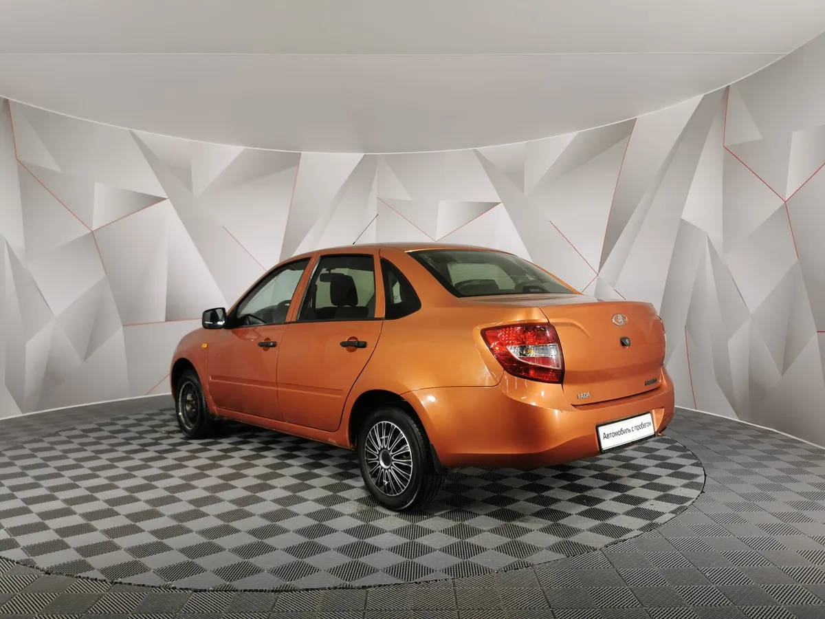 ВАЗ (Lada) Granta 1.6 AT 16кл (98 л.с.) Оранжевый в АВИЛОН. Слайд №4