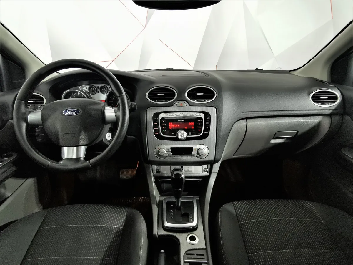 Ford Focus 1.6 AT (101 л.с.) Titanium Фиолетовый в АВИЛОН. Слайд №11