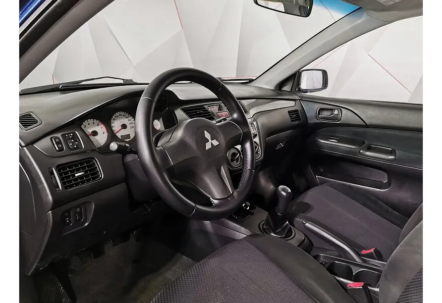 Mitsubishi Lancer 1.6 MT (100 л.с.) Синий в АВИЛОН. Слайд №15