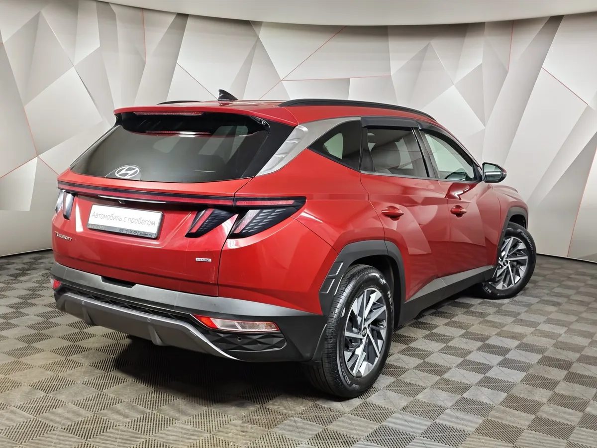 Hyundai Tucson 2.0 AT 4WD (142 л.с.) Красный в АВИЛОН. Слайд №2