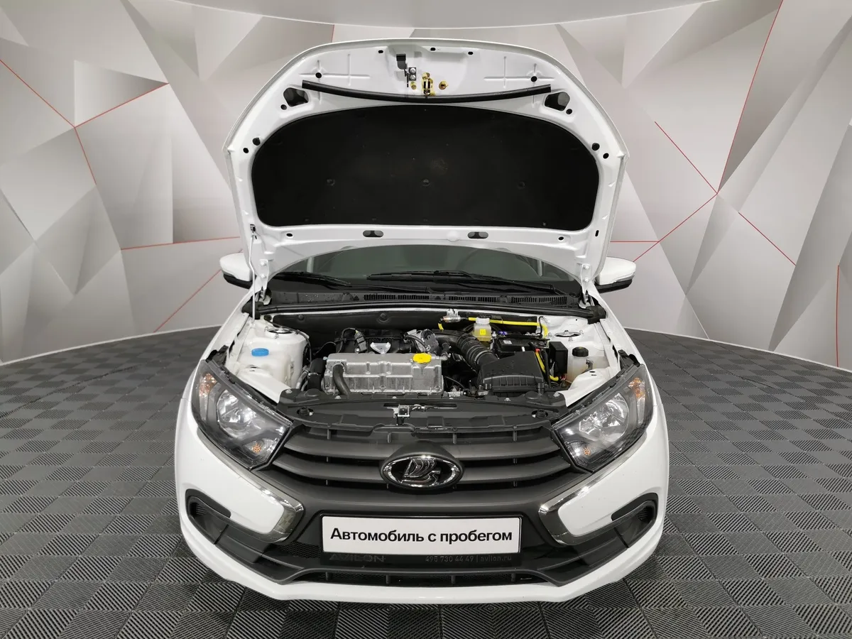 ВАЗ (Lada) Granta 1.6 MT 16кл (98 л.с.) Белый в АВИЛОН. Слайд №11
