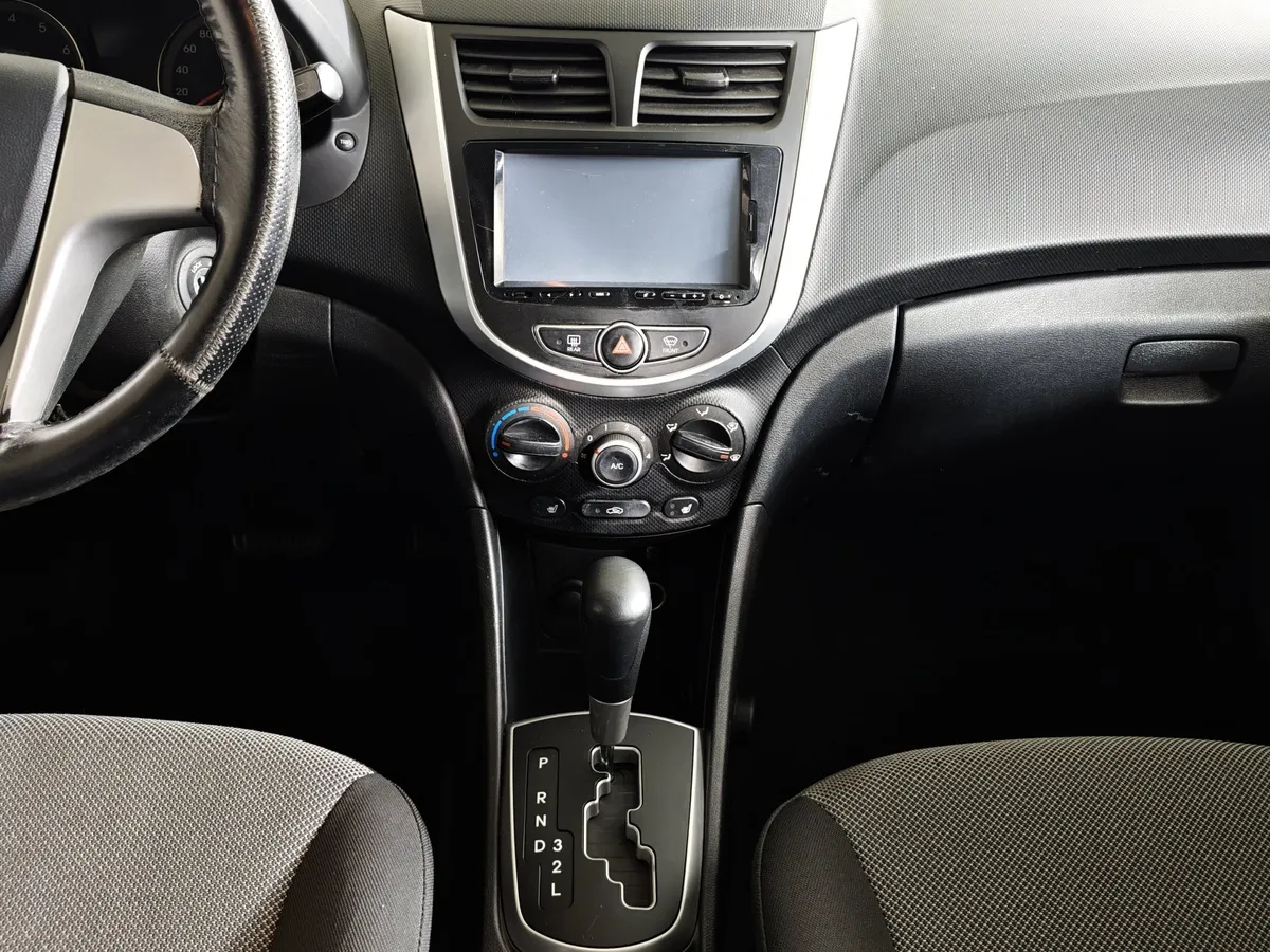 Hyundai Solaris 1.6 AT (123 л.с.) Optima Белый в АВИЛОН. Слайд №15
