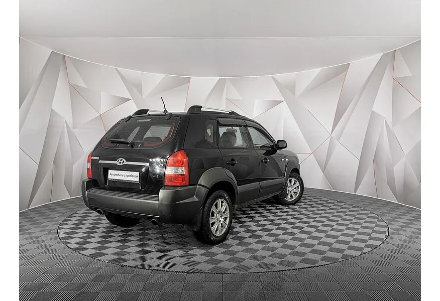 Hyundai Tucson 2.7 AT 4WD (175 л.с.) Черный в АВИЛОН. Слайд №2
