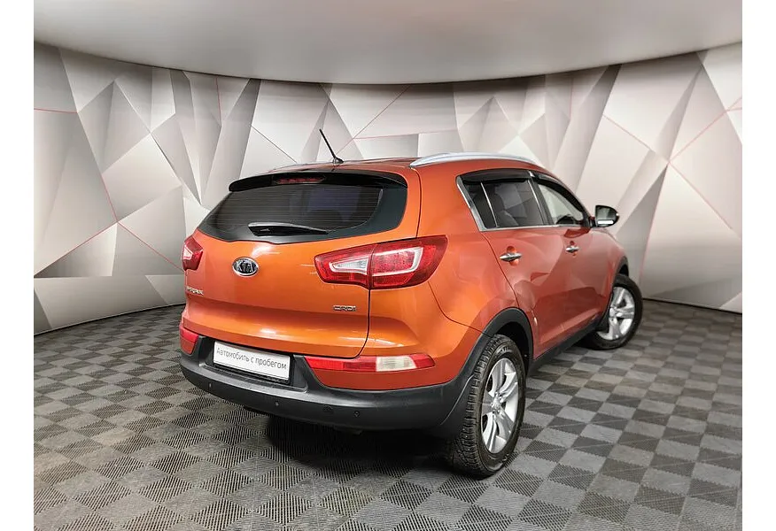 Kia Sportage 2.0 AT 4WD (142 л.с.) Оранжевый в АВИЛОН. Слайд №2