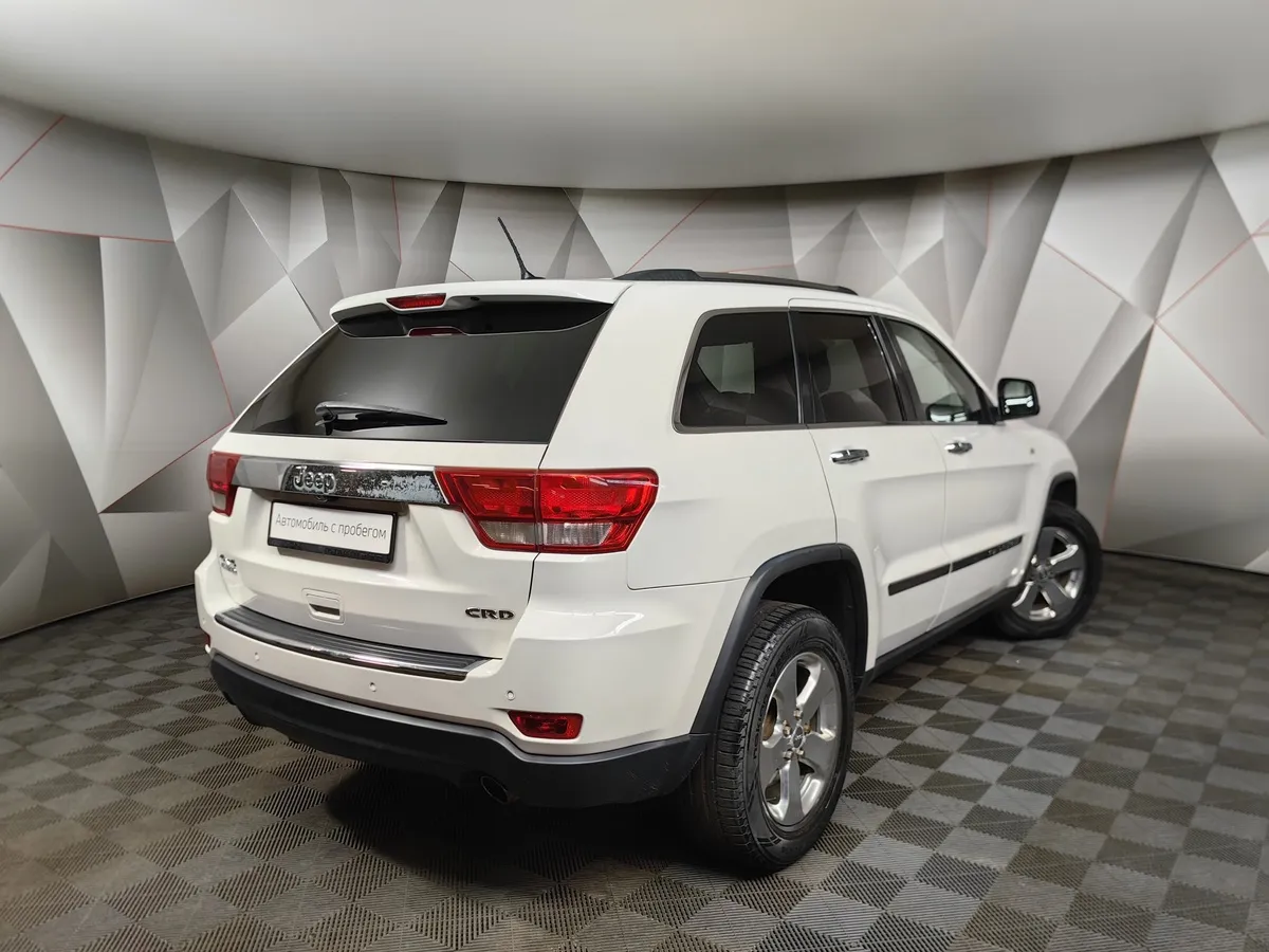 Jeep Grand Cherokee 3.0 TD AT (241 л.с.) Белый в АВИЛОН. Слайд №2