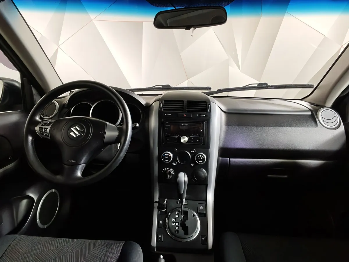 Suzuki Grand Vitara 2.0 AT (140 л.с.) Серый в АВИЛОН. Слайд №12