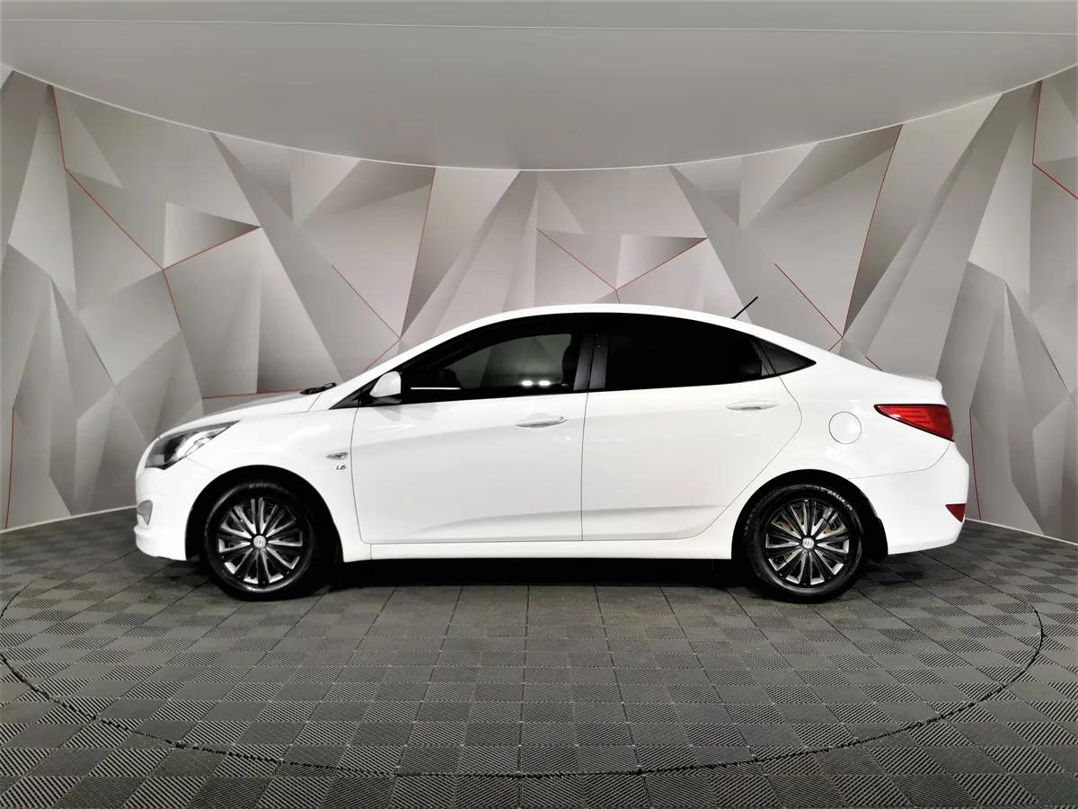 Hyundai Solaris 1.6 MT (123 л.с.) Белый в АВИЛОН. Слайд №5