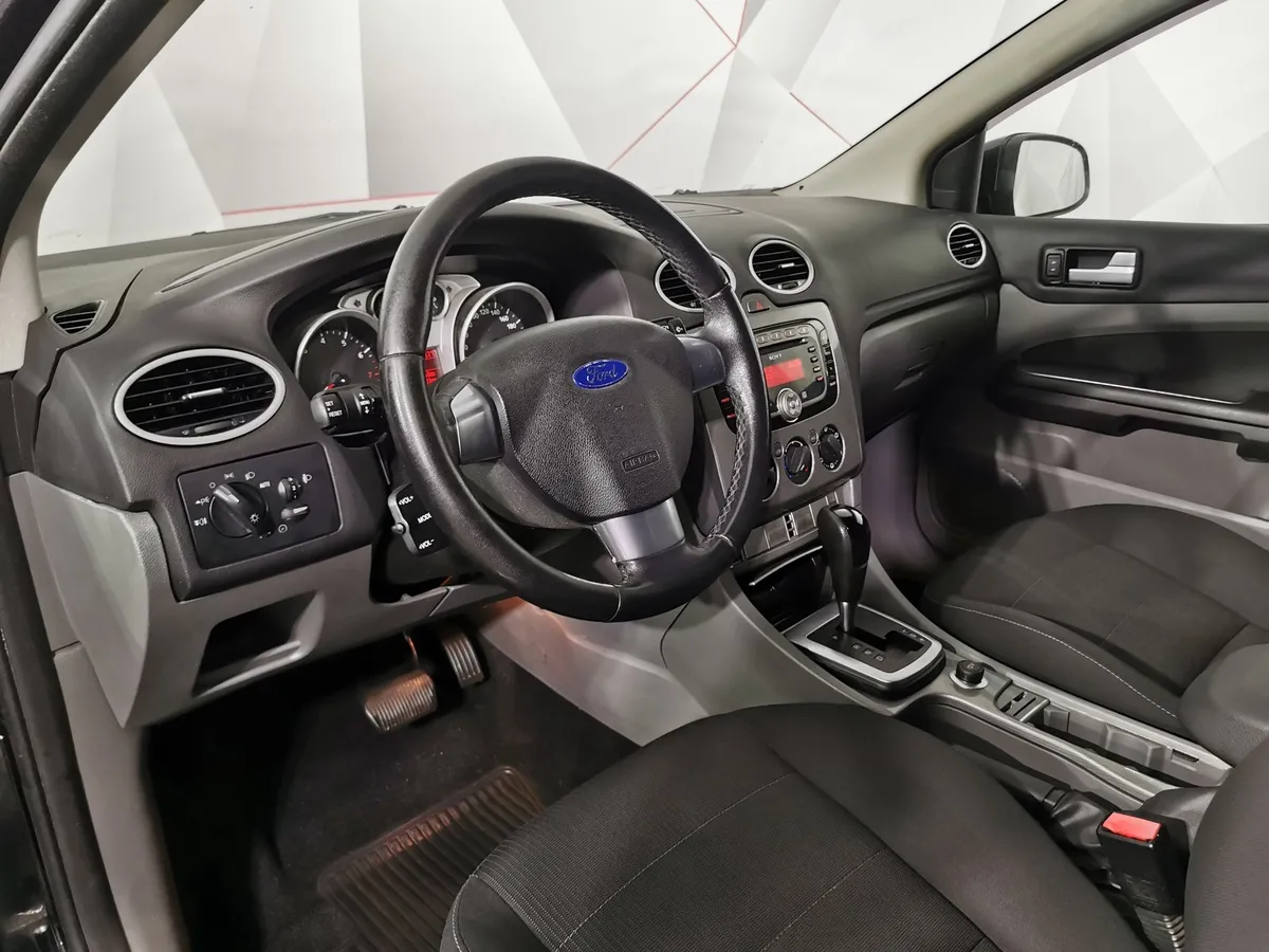 Ford Focus 2.0 AT (145 л.с.) Ghia Черный в АВИЛОН. Слайд №18