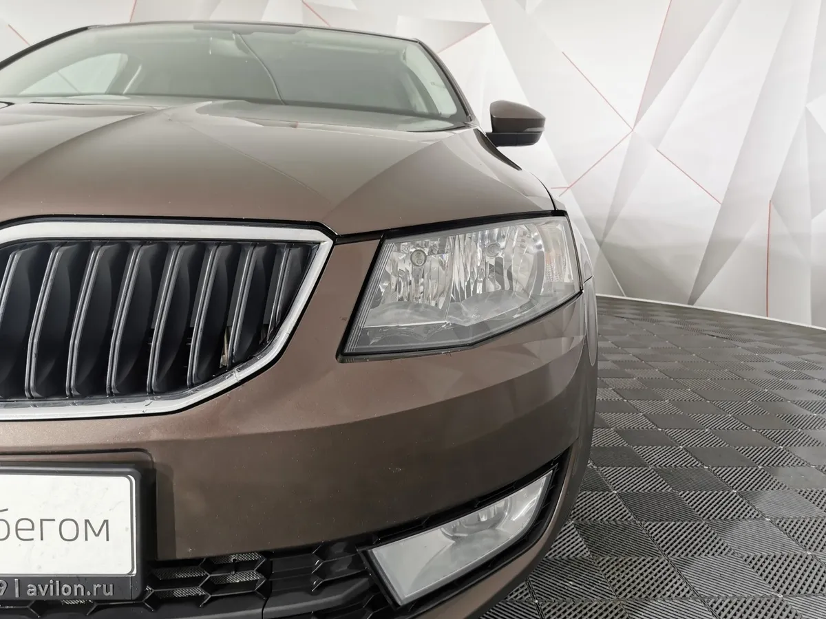 Skoda Octavia 1.6 MPI AT (110 л.с.) Коричневый в АВИЛОН. Слайд №10