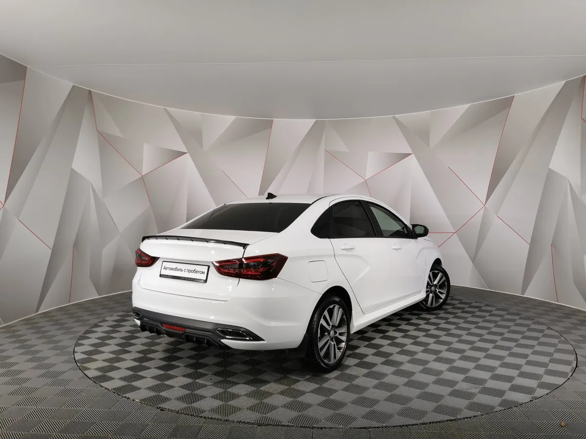 ВАЗ (Lada) Vesta 1.8 CVT (122 л.с.) Enjoy'24 Белый в АВИЛОН. Слайд №2