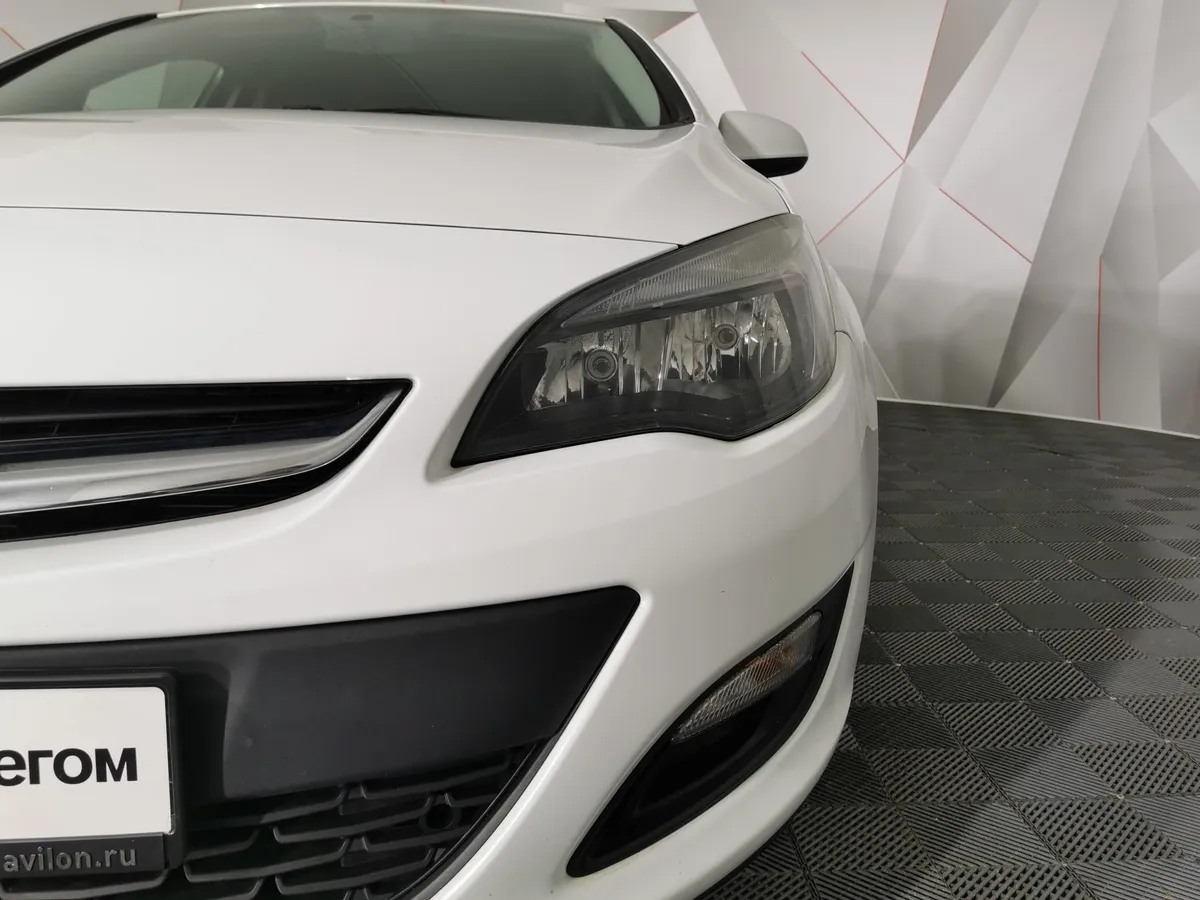 Opel Astra 1.6 AT (115 л.с.) Белый в АВИЛОН. Слайд №10