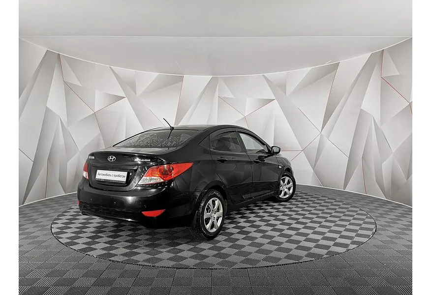 Hyundai Solaris 1.4 AT (100 л.с.) Active Plus Черный в АВИЛОН. Слайд №2