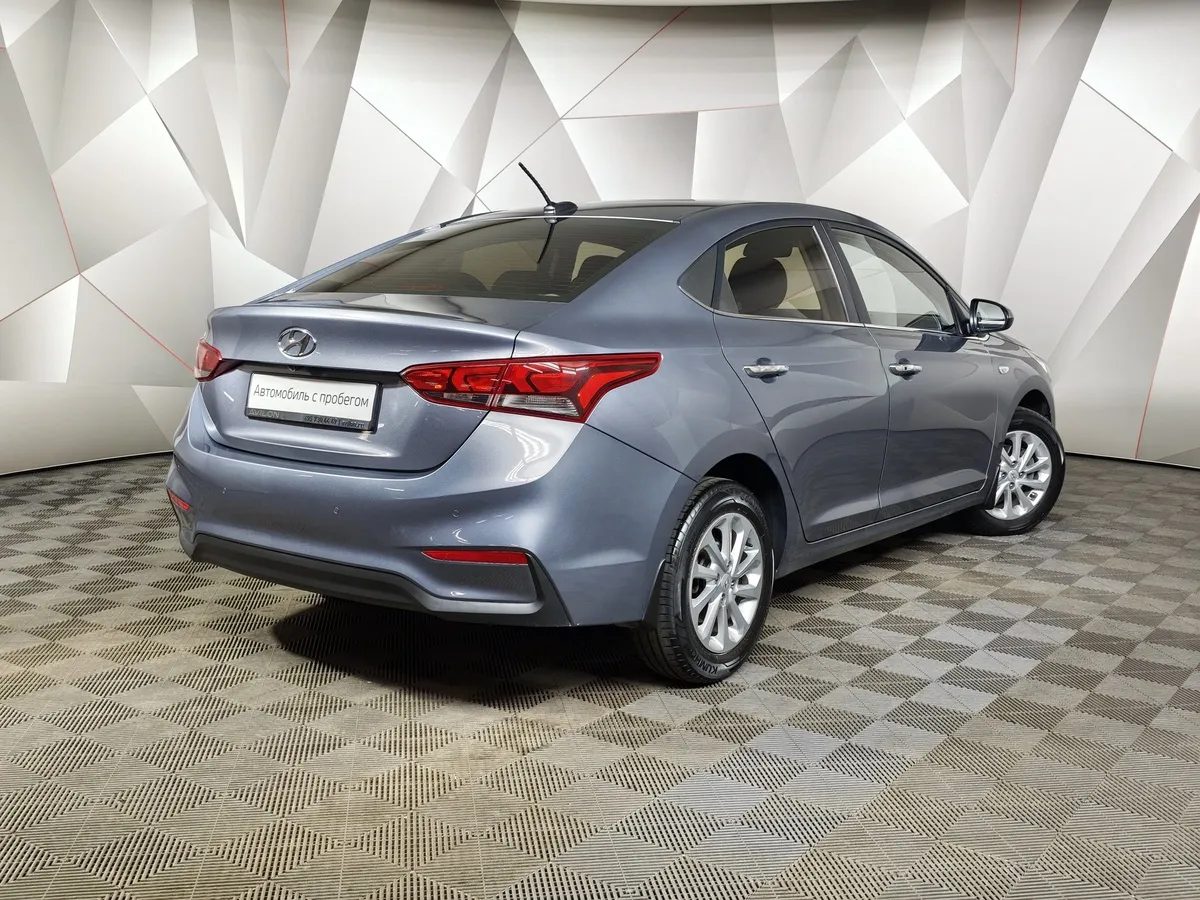 Hyundai Solaris 1.6 AT (123 л.с.) Elegance Серый в АВИЛОН. Слайд №2