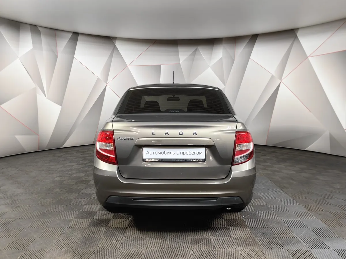 ВАЗ (Lada) Granta 1.6 MT 16 кл (106 л.с.) Коричневый в АВИЛОН. Слайд №8