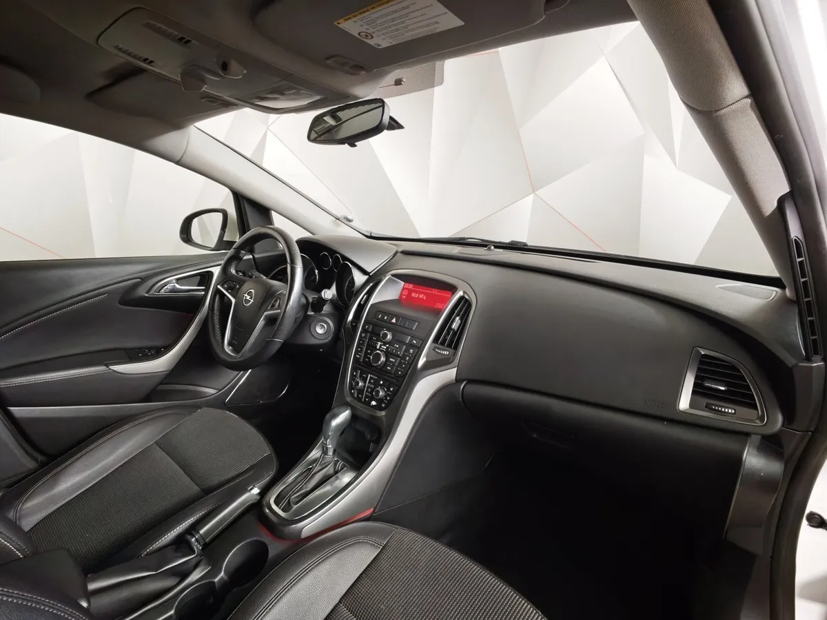 Opel Astra 1.6 AT (115 л.с.) Белый в АВИЛОН. Слайд №12