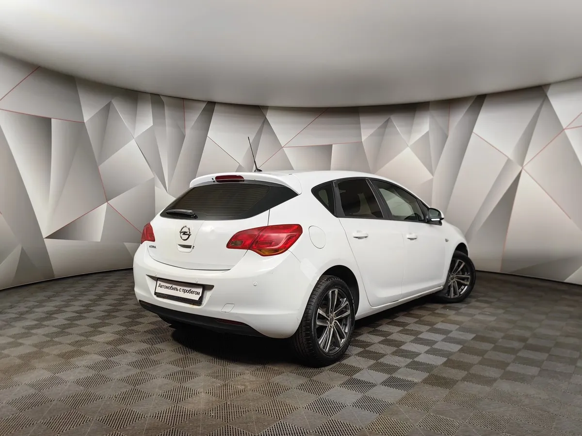Opel Astra 1.6 MT (115 л.с.) Белый в АВИЛОН. Слайд №2