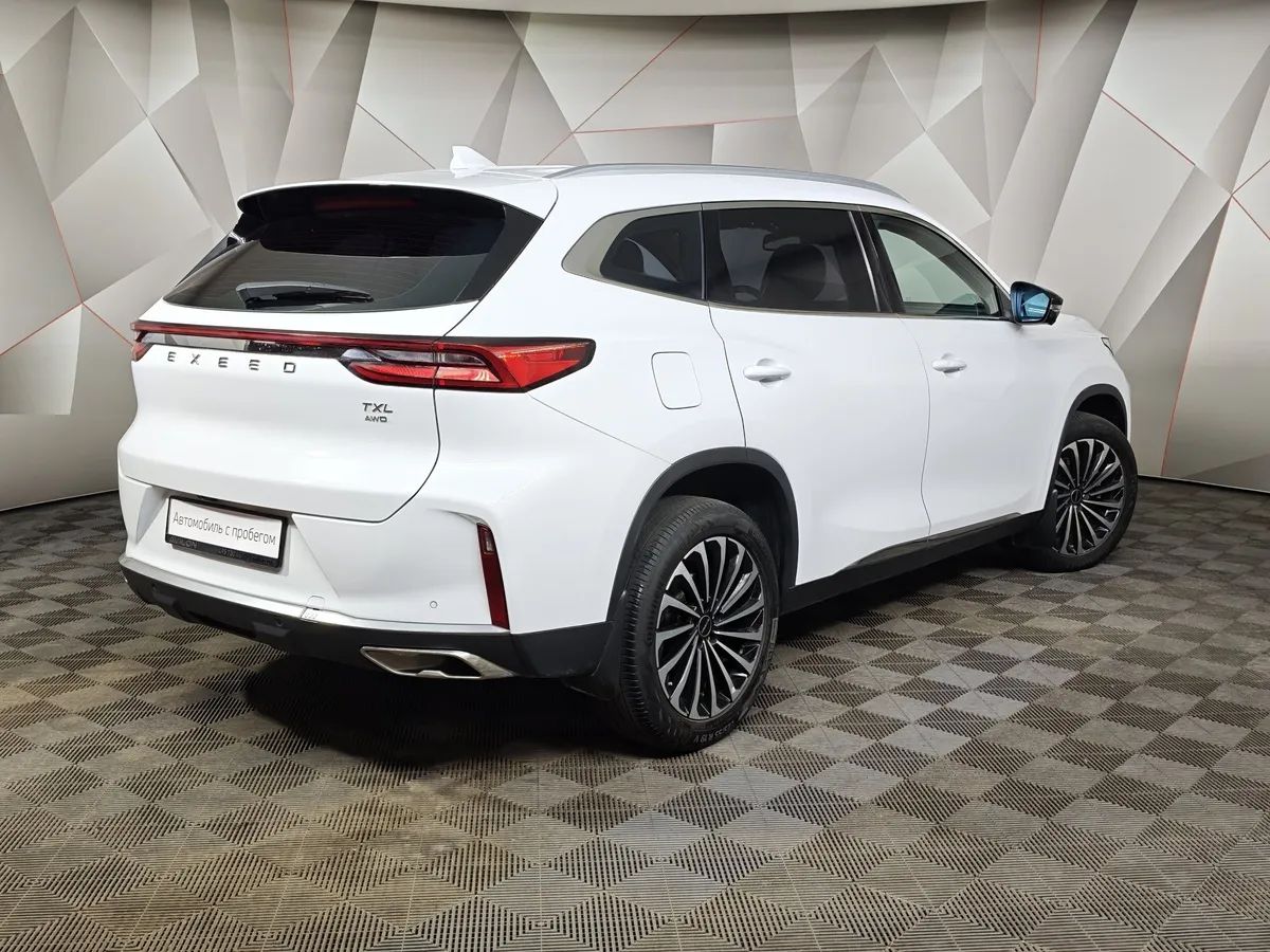 EXEED TXL 1.6 TGDI DCT7 AWD (186 л.с.) Белый в АВИЛОН. Слайд №2