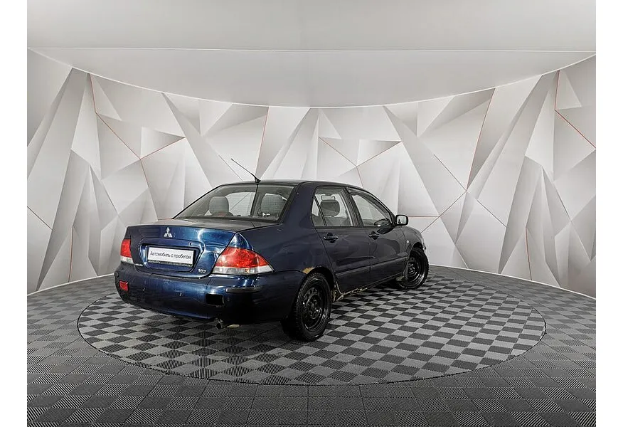 Mitsubishi Lancer 1.6 AT (98 л.с.) Синий в АВИЛОН. Слайд №2