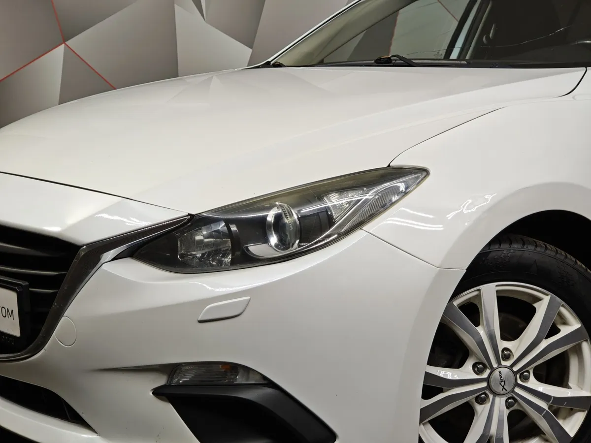 Mazda 3 1.6 MT (104 л.с.) Белый в АВИЛОН. Слайд №10