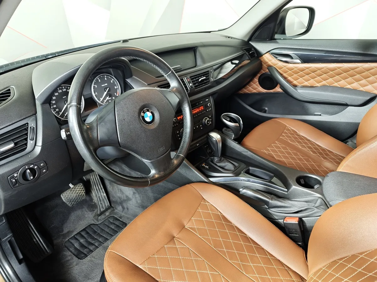 BMW X1 sDrive18i AT (150 л.с.) Base Локальная сборка Коричневый в АВИЛОН. Слайд №12
