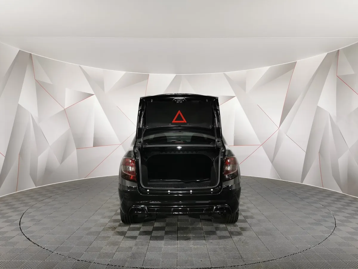 ВАЗ (Lada) Granta 1.6 MT 8кл (87 л.с.) Черный в АВИЛОН. Слайд №11