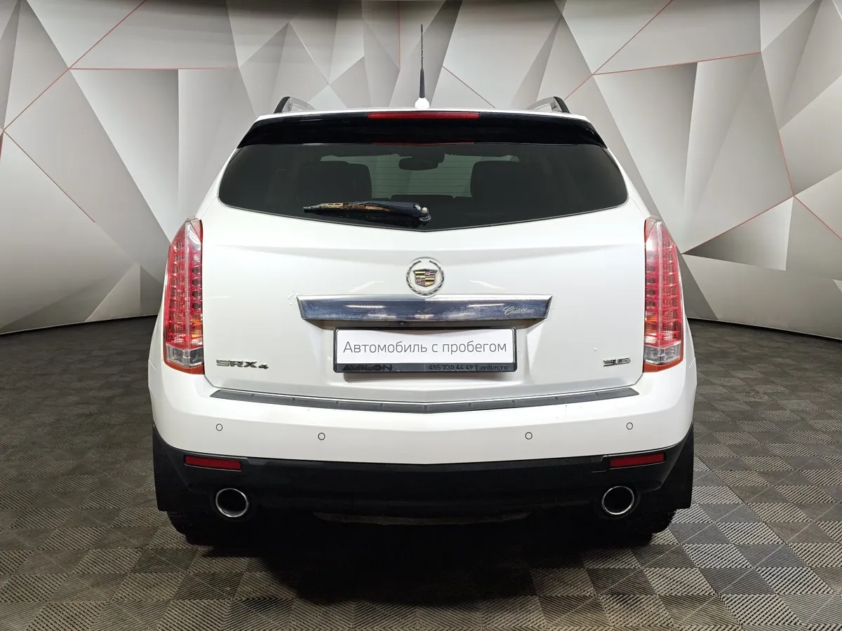 Cadillac SRX 3.6 AT AWD (318 л.с.) Белый в АВИЛОН. Слайд №8
