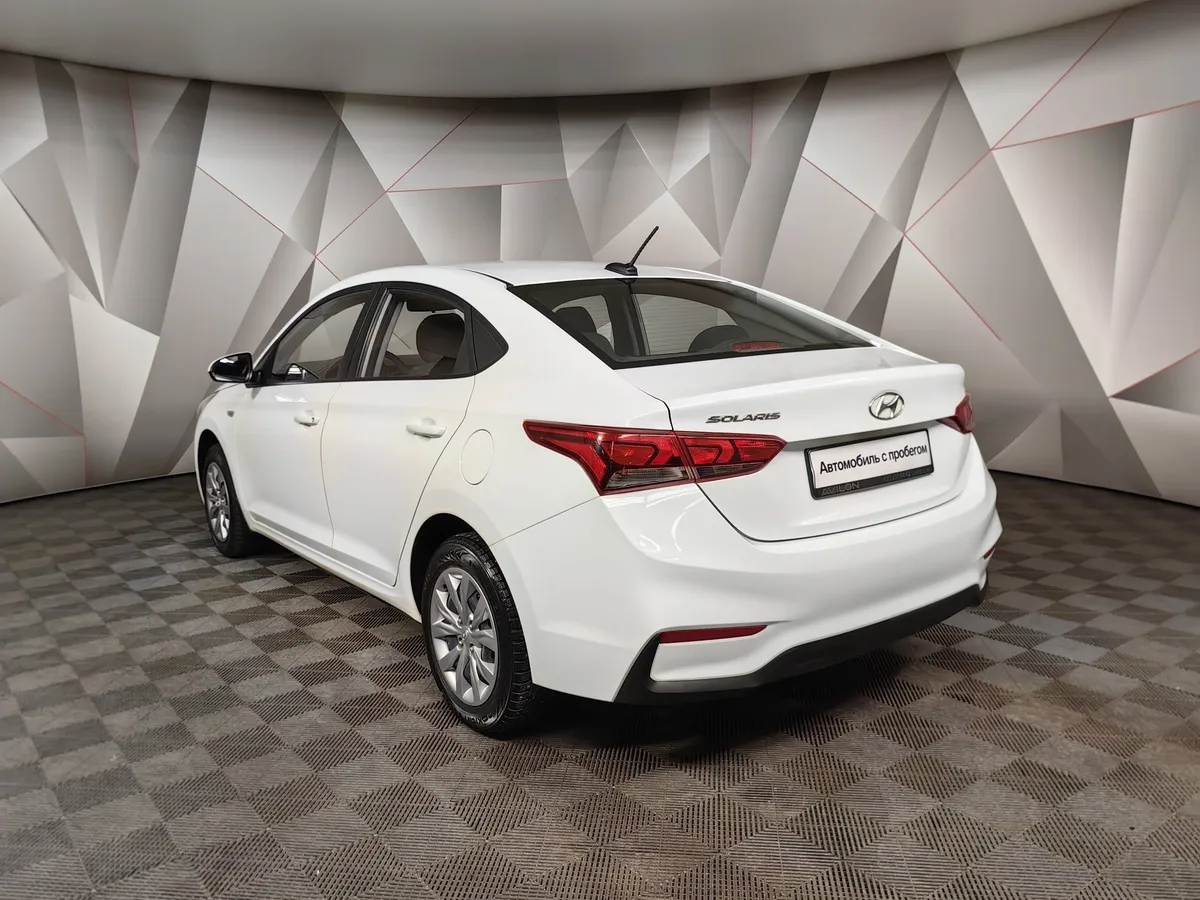 Hyundai Solaris 1.4 MT (107 л.с.) Active Белый в АВИЛОН. Слайд №4