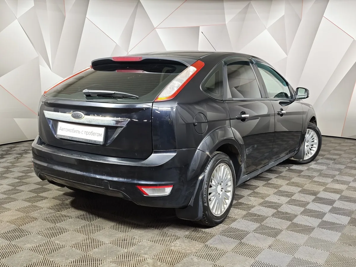 Ford Focus 1.8 MT (125 л.с.) Ghia Черный в АВИЛОН. Слайд №2