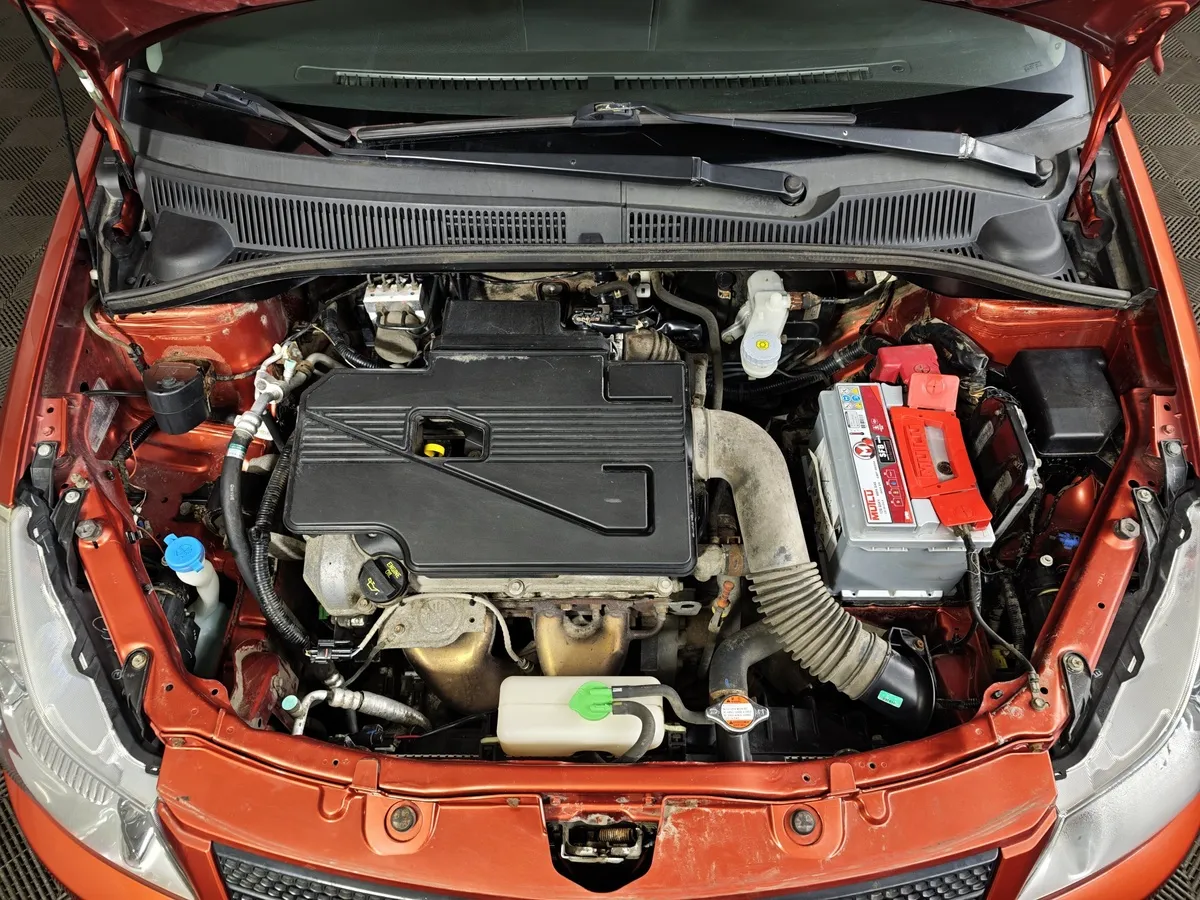 Suzuki SX4 1.6 AT (107 л.с.) Оранжевый в АВИЛОН. Слайд №11