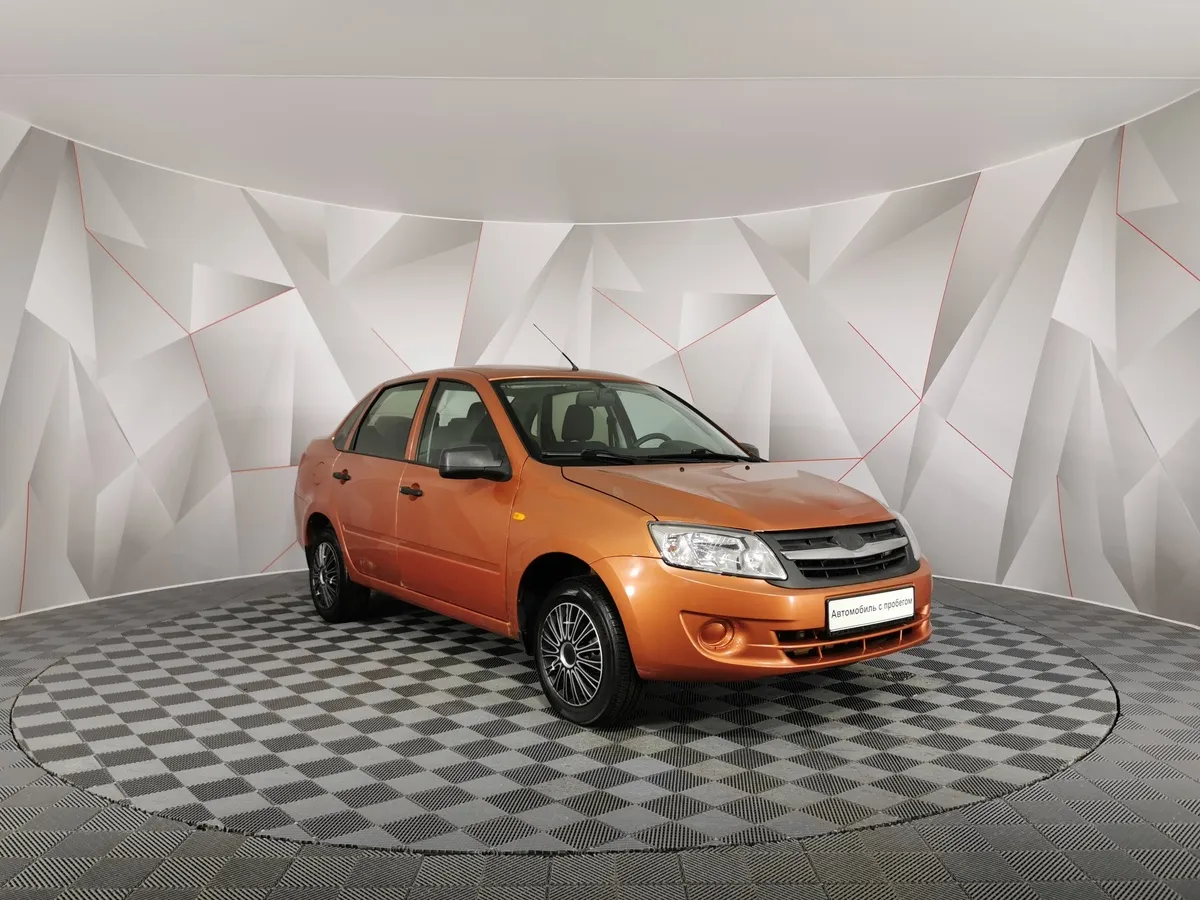 ВАЗ (Lada) Granta 1.6 AT 16кл (98 л.с.) Оранжевый в АВИЛОН. Слайд №3