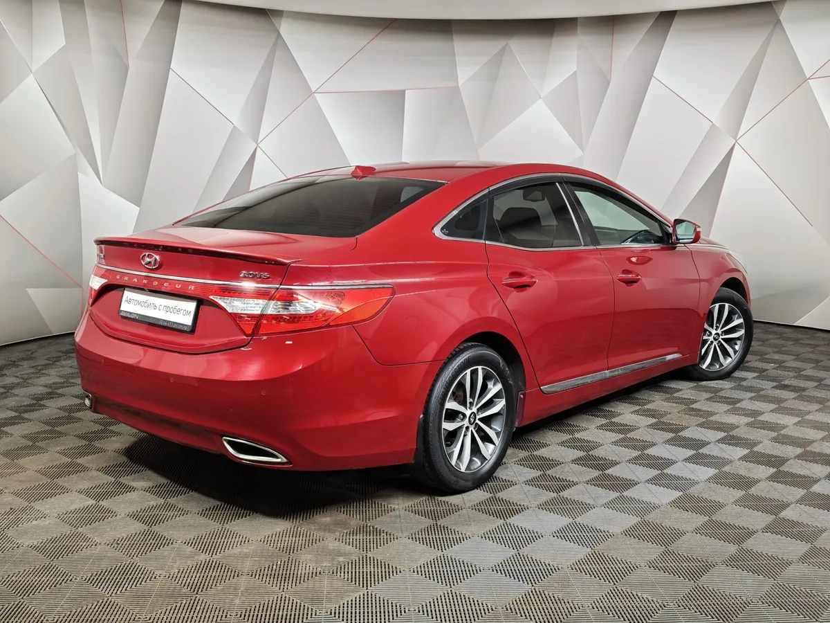 Hyundai Grandeur 3.0 AT (250 л.с.) Business Красный в АВИЛОН. Слайд №2