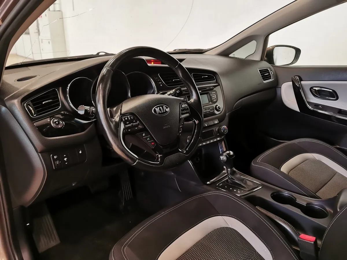 Kia Ceed 1.6 AT (129 л.с.) Коричневый в АВИЛОН. Слайд №18