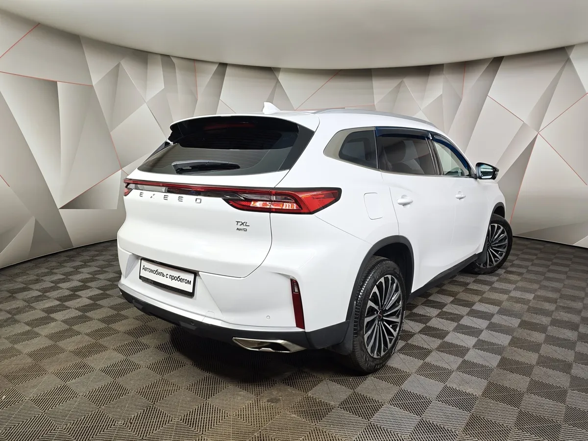 EXEED TXL 1.6 TGDI DCT7 AWD (186 л.с.) Белый в АВИЛОН. Слайд №2