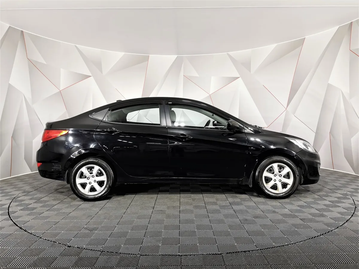 Hyundai Solaris 1.4 MT (107 л.с.) Active Черный в АВИЛОН. Слайд №6