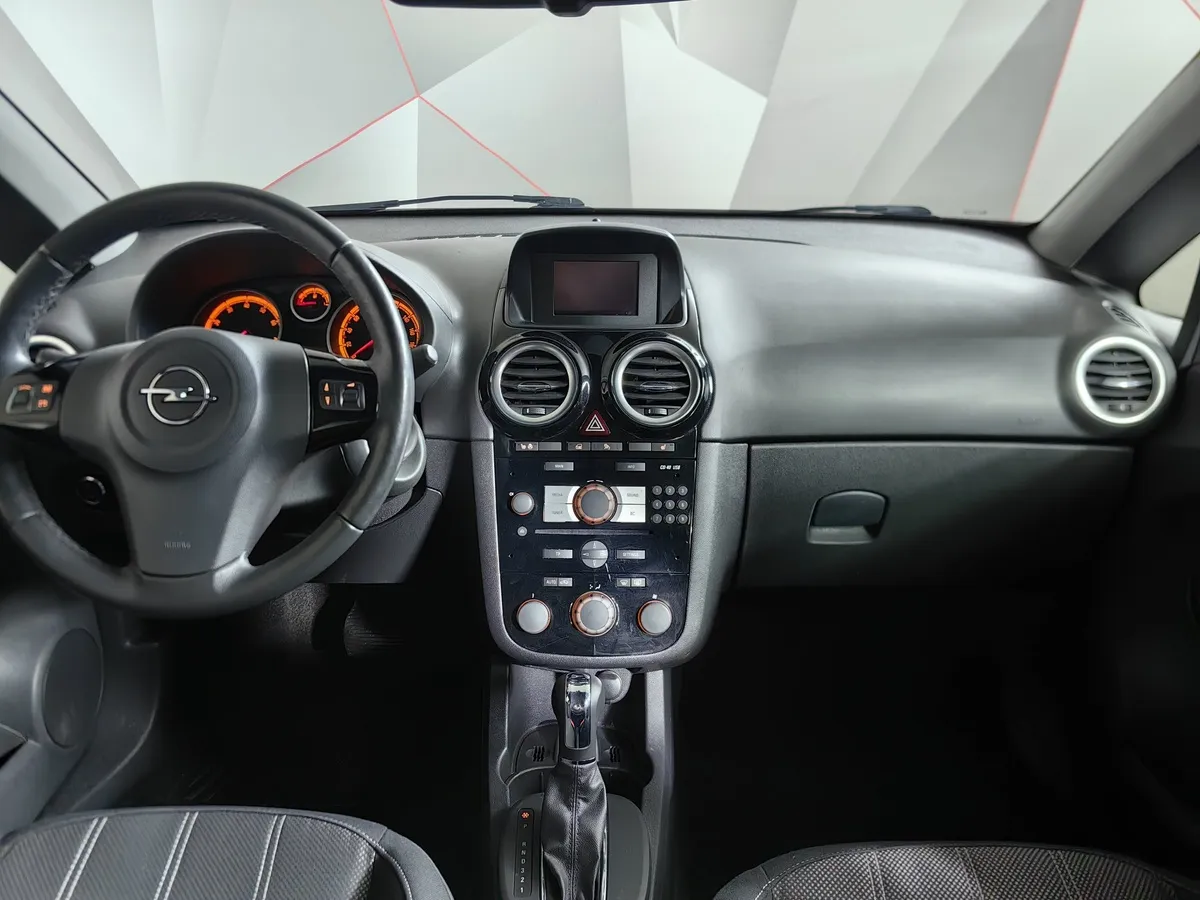 Opel Corsa 1.4 AT (101 л.с.) Черный в АВИЛОН. Слайд №14