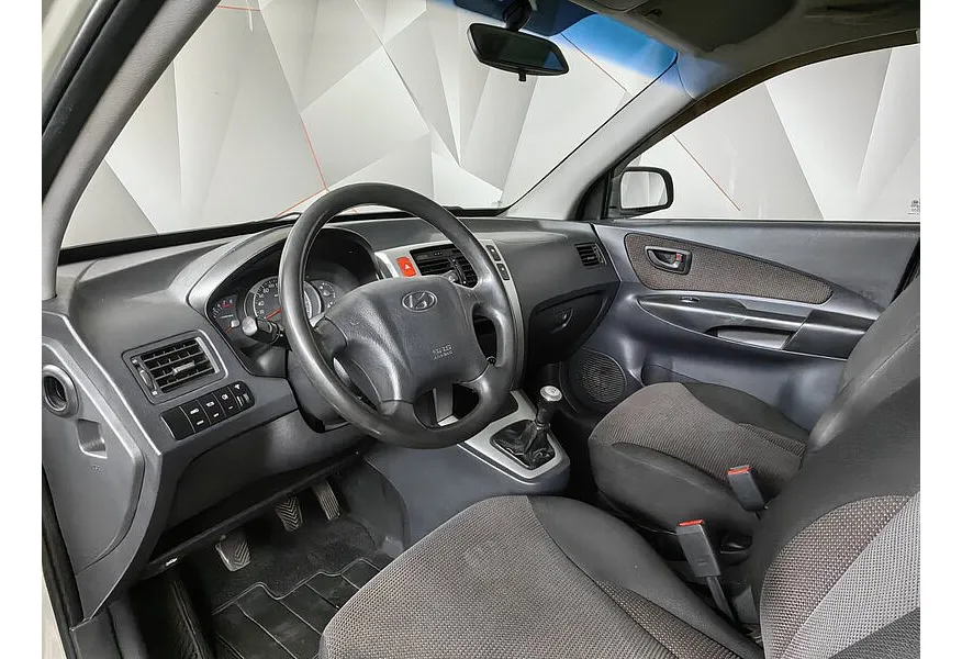 АВИЛОН - Hyundai Tucson 2.0 MT 4WD (140 л.с.) Серебристый - slide 13