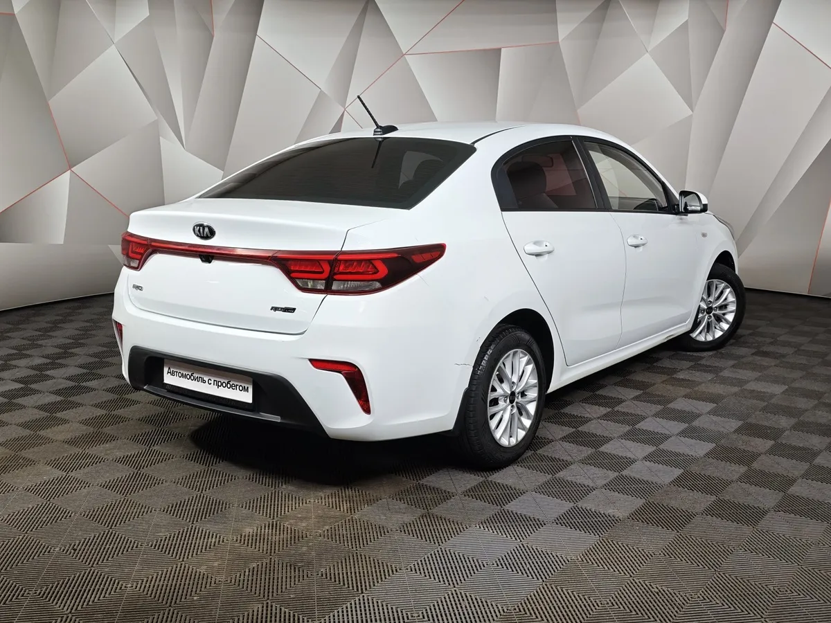 Kia Rio 1.6 AT (123 л.с.) Белый в АВИЛОН. Слайд №2