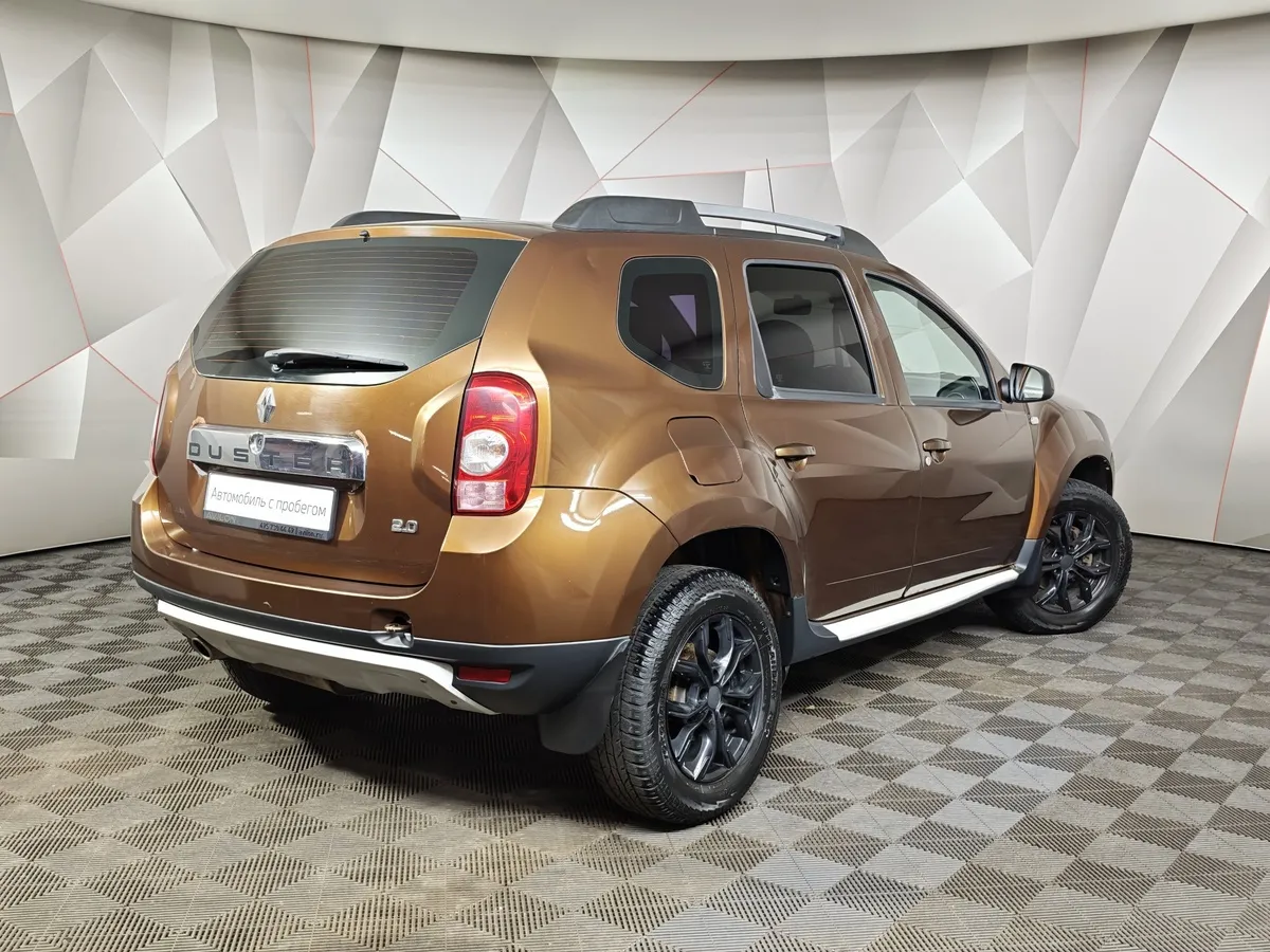 Renault Duster 2.0 MT 4x4 (143 л.с.) Коричневый в АВИЛОН. Слайд №2