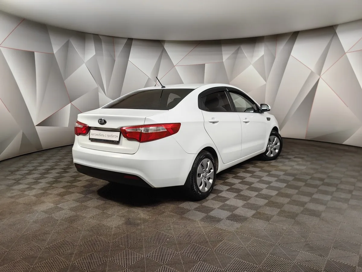 Kia Rio 1.6 MT (123 л.с.) Белый в АВИЛОН. Слайд №2