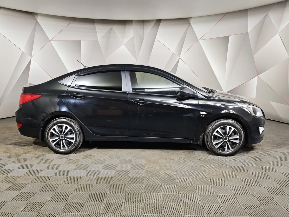 Hyundai Solaris 1.6 MT (123 л.с.) Comfort Черный в АВИЛОН. Слайд №6