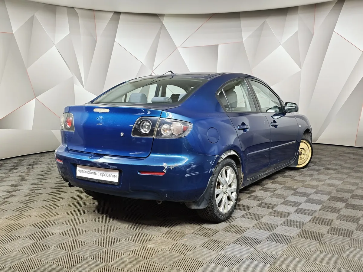 Mazda 3 1.6 AT (105 л.с.) Зеленый в АВИЛОН. Слайд №2