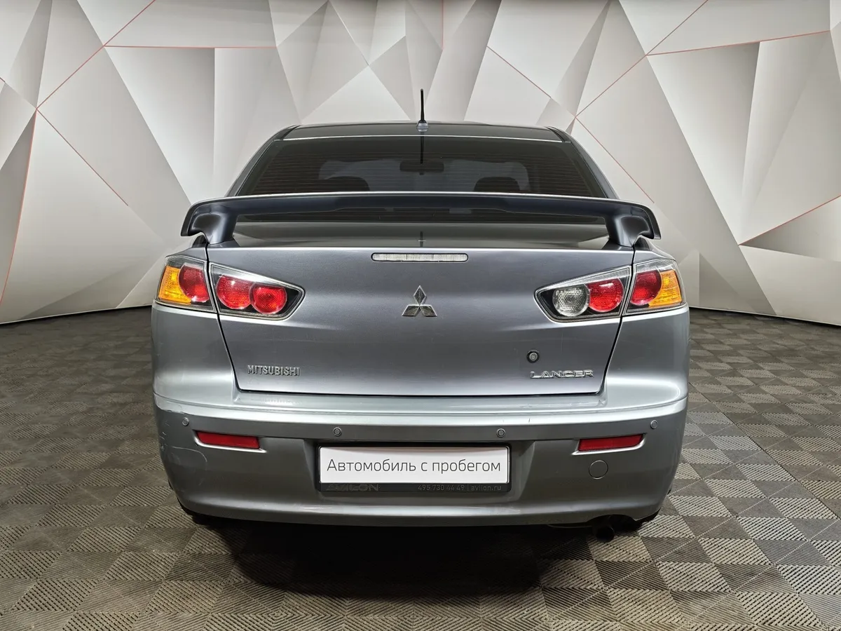 Mitsubishi Lancer 1.6 AT (117 л.с.) Серый в АВИЛОН. Слайд №8