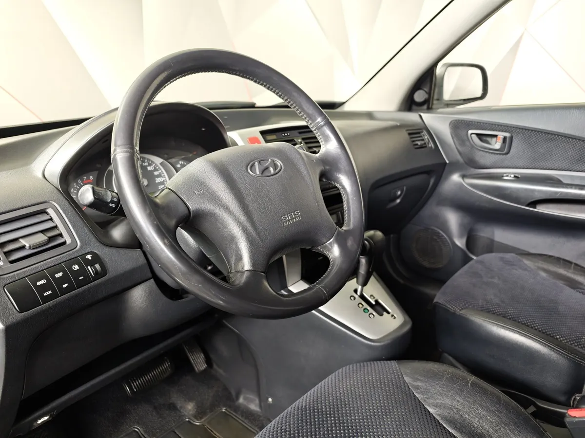 Hyundai Tucson 2.0 AT 4WD (142 л.с.) Серебристый в АВИЛОН. Слайд №18