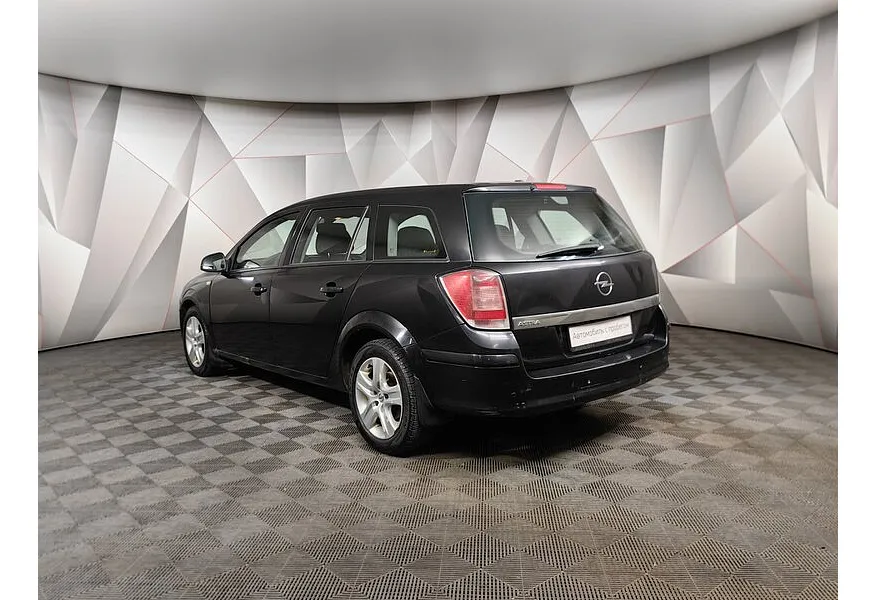 Opel Astra 1.8 AT (140 л.с.) Черный в АВИЛОН. Слайд №4