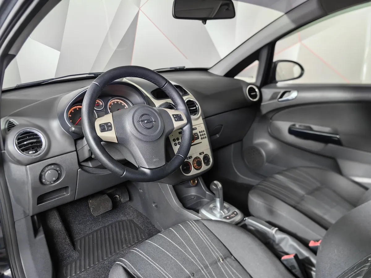 Opel Corsa 1.2 Easytronic (80 л.с.) Черный в АВИЛОН. Слайд №19