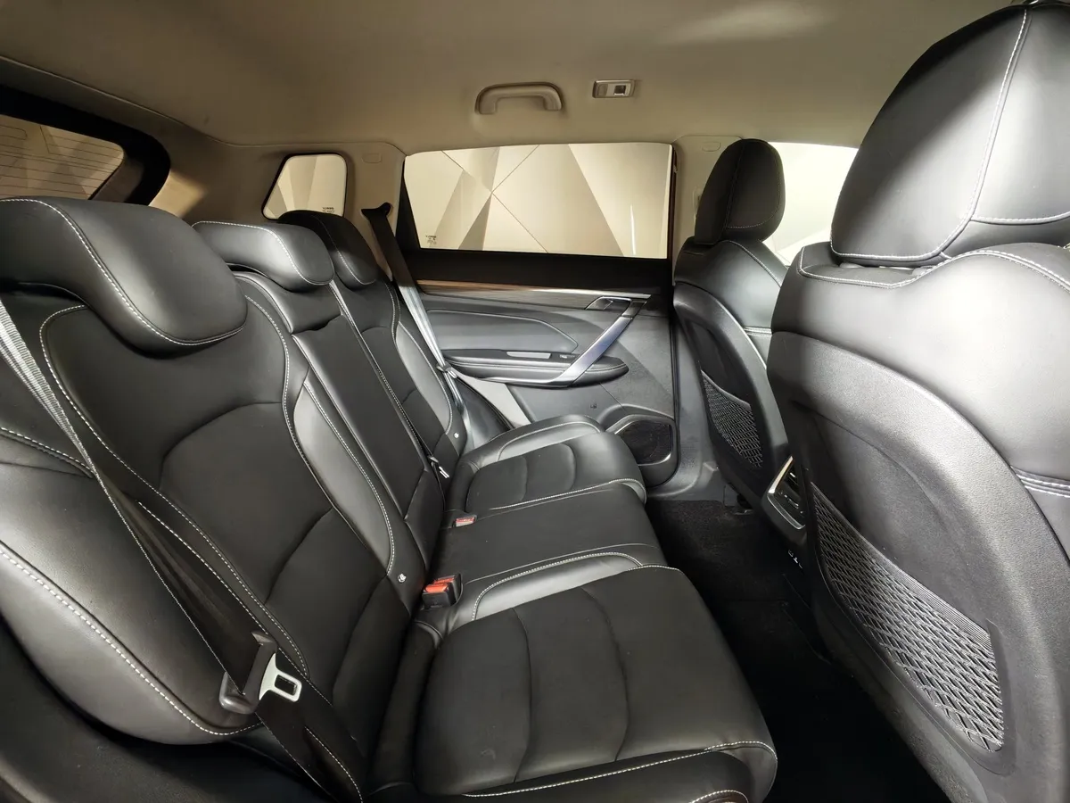 Geely Atlas Pro 1.5T 7DCT AWD (177 л.с.) Flagship Красный в АВИЛОН. Слайд №16
