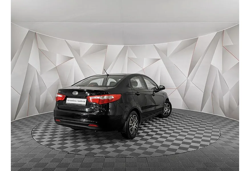 Kia Rio 1.6 MT (123 л.с.) Черный в АВИЛОН. Слайд №2