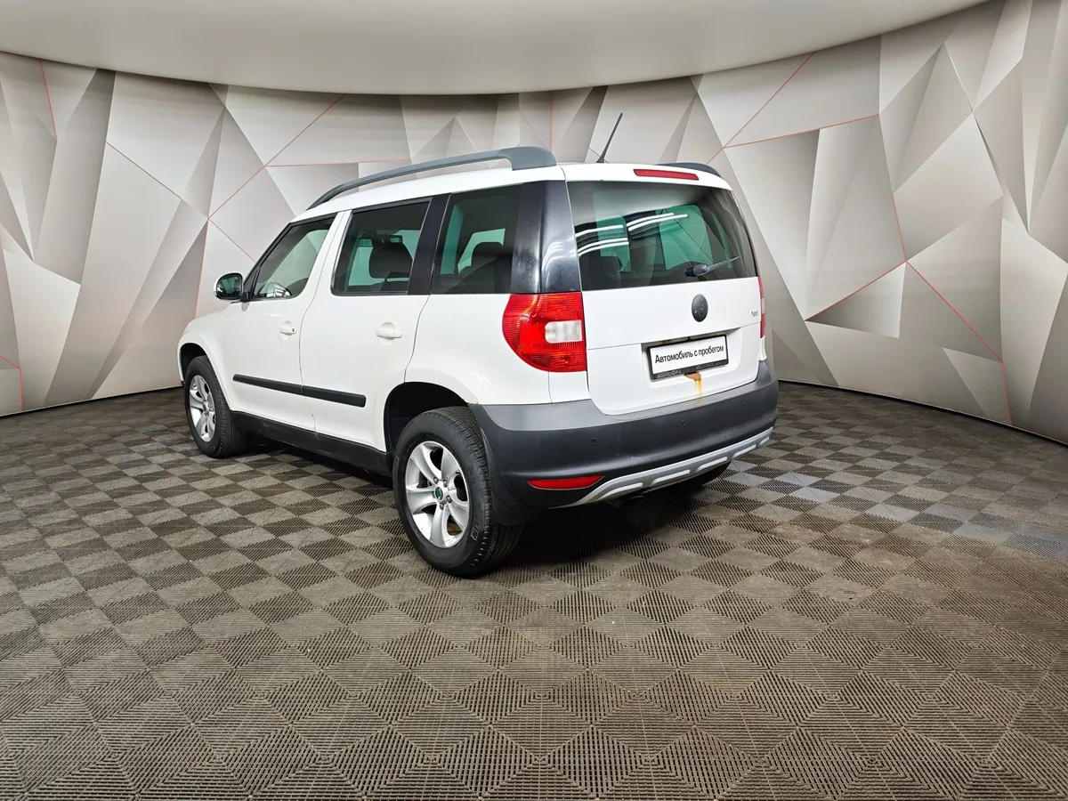 Skoda Yeti 1.2 TSI DSG (105 л.с.) Active Белый в АВИЛОН. Слайд №4