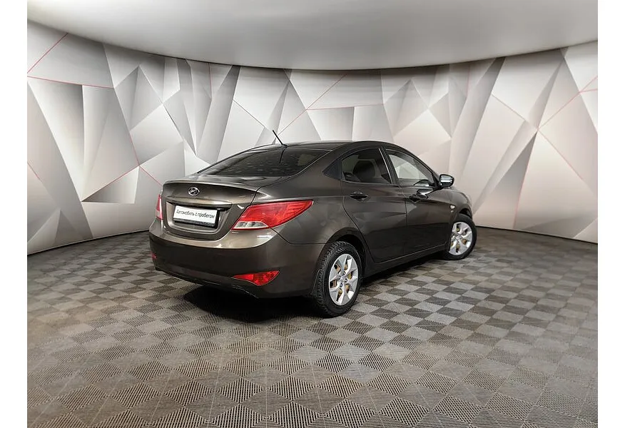 Hyundai Solaris 1.6 MT (123 л.с.) Comfort Коричневый в АВИЛОН. Слайд №2